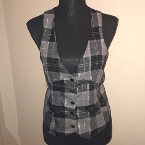 Fashionable gray and black button up vest. Small.